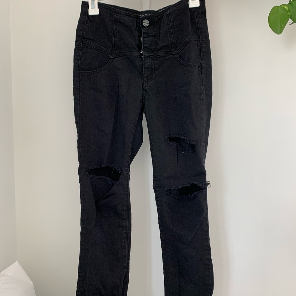 Black skinny jeans. High waisted. Distressed.